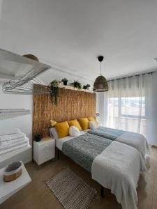 Katil atau katil-katil dalam bilik di Vivienda Oasis Murcia
