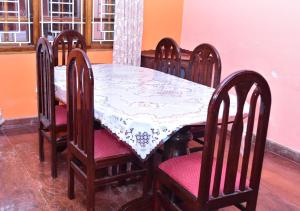 Posezení v ubytování Kaveri Homestay
