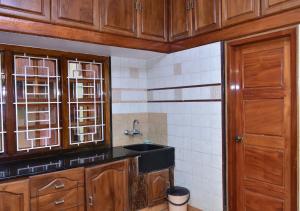 Kuchyň nebo kuchyňský kout v ubytování Kaveri Homestay