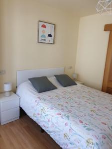 A bed or beds in a room at Casa Leonor