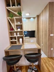 Kuchyň nebo kuchyňský kout v ubytování Apartman Lux Doboj 2