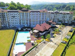 an aerial view of a resort with a swimming pool at S&K One Oasis 2BR Condo Unit 2506 in Cagayan de Oro