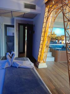 A bed or beds in a room at Posada la Leyenda
