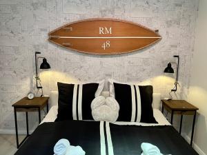 En eller flere senge i et værelse på Apart Pier 2