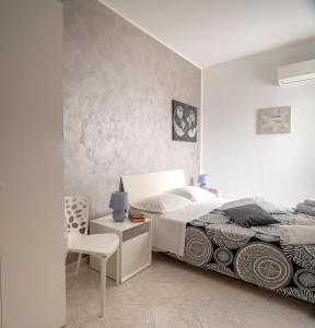 Postel nebo postele na pokoji v ubytování A casa tua Affitti brevi