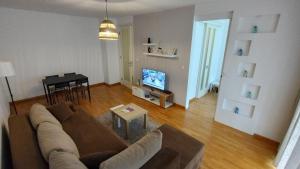 TV a/nebo společenská místnost v ubytování Apartment Belville, Suncokret 26