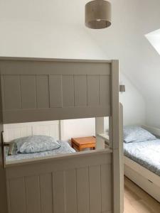 Letto o letti in una camera di Maison Monts d’Arree 3 chambres