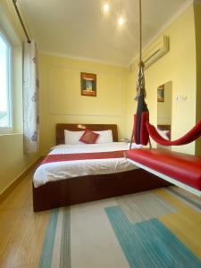 Postel nebo postele na pokoji v ubytování Dylan Hotel