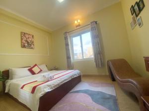 Postel nebo postele na pokoji v ubytování Dylan Hotel