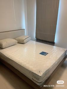 a mattress sitting on a bed in a room at unio72 in Ban Khlong Samrong
