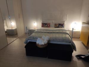 A bed or beds in a room at Terrazza Sui Sassi