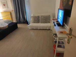 A bed or beds in a room at Terrazza Sui Sassi