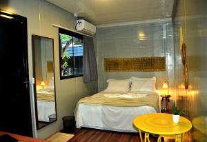 Katil atau katil-katil dalam bilik di Innbox - Porto Belo +26 gambar