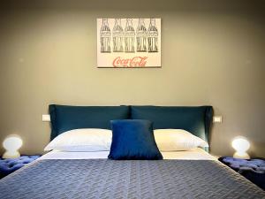 A bed or beds in a room at La Sosta in Toscana