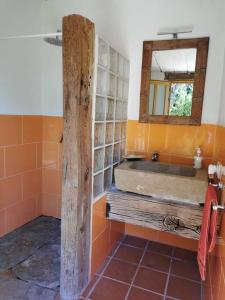 a bathroom with a sink and a mirror at VILLA CARMEN in Alcossebre