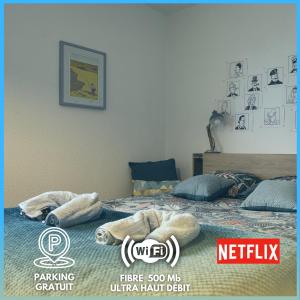 Postel nebo postele na pokoji v ubytování Tout Inclus - Plein Centre - Netflix - Moontown