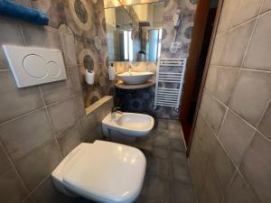 Ένα μπάνιο στο Albergo Di Murlo