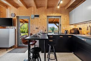 Foto dalla galleria di Zajęcza Chatka - Jeziora, Las , Łódka, Rower a Sitno