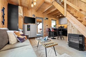 Foto dalla galleria di Zajęcza Chatka - Jeziora, Las , Łódka, Rower a Sitno