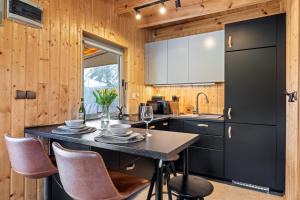 Foto dalla galleria di Zajęcza Chatka - Jeziora, Las , Łódka, Rower a Sitno