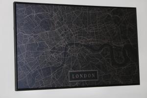 a poster of a map of the city of london at Glamorous Two bed room flat in London