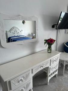 TV a/nebo společenská místnost v ubytování Frente al mar, comodo y familiar