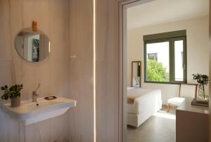 Koupelna v ubytování Arbora Olea Luxury Resort + 37 fotografií