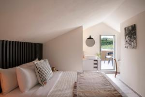 Postel nebo postele na pokoji v ubytování Arbora Olea Luxury Resort