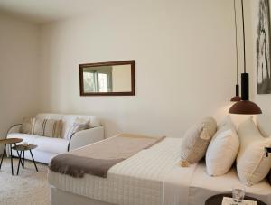 Postel nebo postele na pokoji v ubytování Arbora Olea Luxury Resort