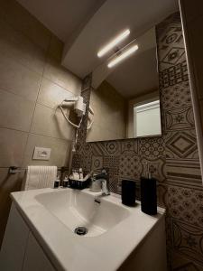 A bathroom at M.Mansion