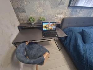 Televízia a/alebo spoločenská miestnosť v ubytovaní M&K Apartament Bałtyk - Sobieszewo - Wyspa Sobieszewska