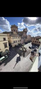 a view of a city with buildings and a street at MONOLOCALE PIAZZA FONTANA GRANDE ALLOGGIO TURISTICO in Viterbo