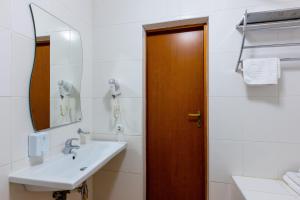 Koupelna v ubytování Tiso Apart Hotel