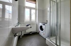 Koupelna v ubytování Oswald Apartments Vienna + 14 fotografií