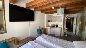 Eldhús eða eldhúskrókur á Aux chambres du Banneret
