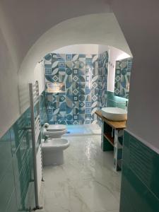 Kúpeľňa v ubytovaní Dante Rooms