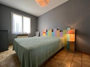 Postel nebo postele na pokoji v ubytování Maison Saint-Denis-d'Oléron, 3 pièces, 6 personnes - FR-1-246A-190