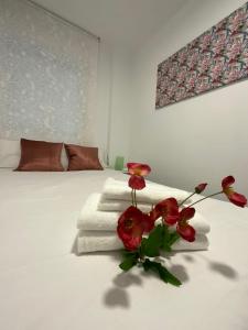 Posteľ alebo postele v izbe v ubytovaní HEROE APARTAMENTO