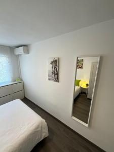 Posteľ alebo postele v izbe v ubytovaní HEROE APARTAMENTO
