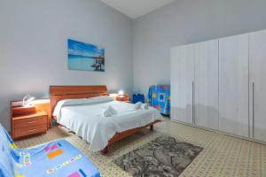 Llit o llits en una habitació de Eracles House near Ortigia Island