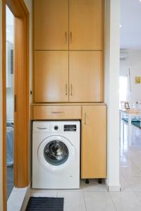 Kuchyň nebo kuchyňský kout v ubytování Kyriakos Apartment