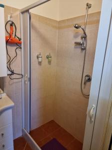 a shower with a glass door in a bathroom at B&B da FRANCESCO Locazione Turistica in Ruvo di Puglia +32 photos