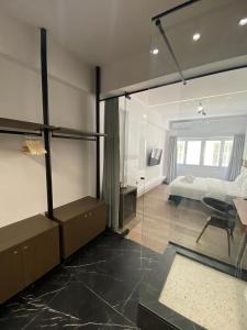 A seating area at Athens Center Boutique Suites Még 3 kép