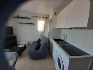 Kuchnia lub aneks kuchenny w obiekcie Sous le soleil des Alpilles