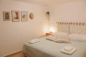 Postel nebo postele na pokoji v ubytování Myrtus Guest House
