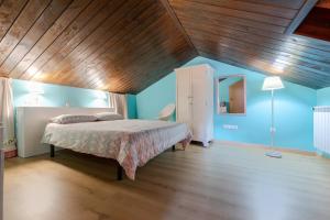 Postel nebo postele na pokoji v ubytování Casa Dieste Apartamentos Turísticos en Boltaña