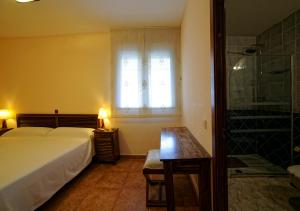 Postel nebo postele na pokoji v ubytování Hostal Rural El Tejar
