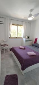 Posteľ alebo postele v izbe v ubytovaní Apartamento PARADISE Solo Familias