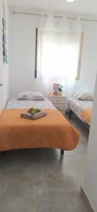 Posteľ alebo postele v izbe v ubytovaní Apartamento PARADISE Solo Familias