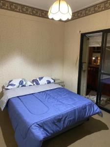 Una cama o camas en una habitación de Departamento en zona centro para 4-6 personas
